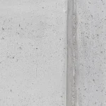 Close-up of a sealed vertical concrete joint